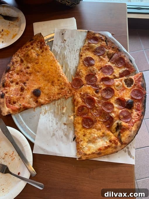 The Eighth of June Digest 3 Half cheese, half pepperoni pizza at Modern Apizza - perfectly cooked and ready to enjoy.