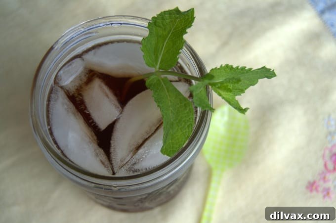 Sweet Southern Brew 2 A delicious and refreshing summertime drink! A tall glass of golden sweet tea with ice and a lemon slice.