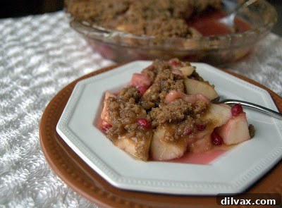 Baked apple pomegranate crisp, ready to be served