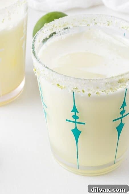 Velvet Lemonade 12 Cold and refreshing limeade - A pitcher and glass of Brazilian Lemonade.