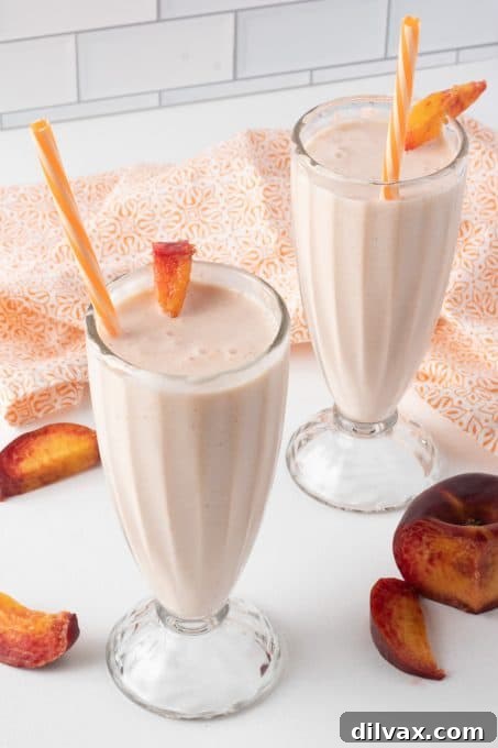Peaches, lemon, lemonade and vanilla ice cream in a milkshake.
