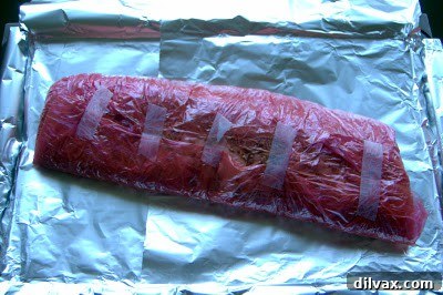 Sweet and Tangy Honey Mustard Ribs 2 Ribs generously coated with whole ground mustard, ready for overnight marination.