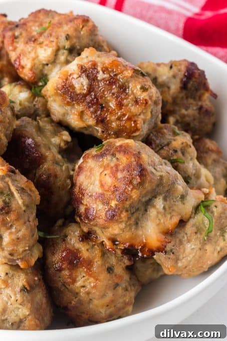 Savory Handcrafted Meatballs 8 Close-up of flavorful and tender meatballs, showing their juicy interior and browned exterior.