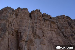 Daily Walnut Bake 8 Sunlight illuminating a distant plateau within the Grand Canyon.