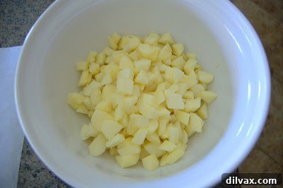 Diced apples in a large bowl