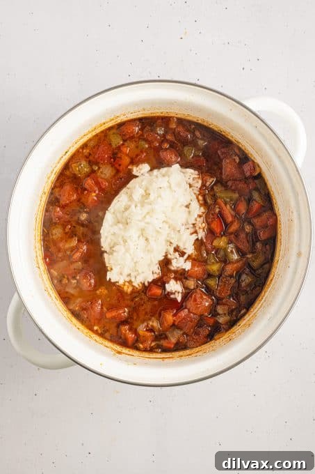 Unstuffed Pepper Soup 6 Rice added to soup with chopped peppers, onions and ground beef.