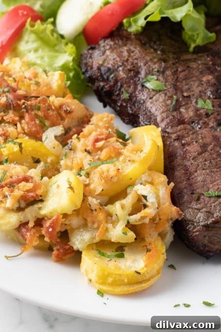 Golden Squash Bake 3 Close-up of a serving of Yellow Squash Casserole, showing the melted cheese and crispy topping.