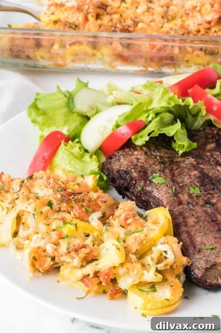 Golden Squash Bake 8 Yellow squash casserole in a ceramic baking dish, ready to be served.