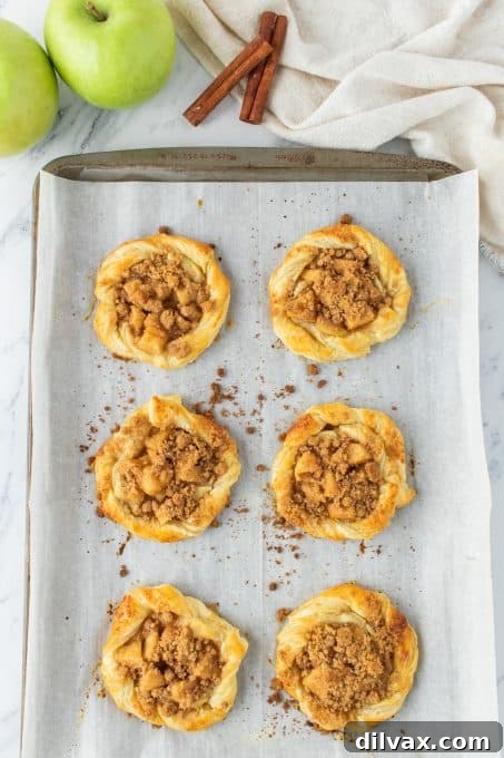 Apple Danish on a baking sheet.