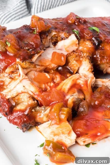 Smoky BBQ Chicken 13 Chicken grilled with BBQ sauce.