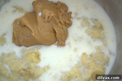 Day 241 - Delicious Peanut Butter Banana Muffins 2 Combining dry and wet ingredients for peanut butter banana muffins