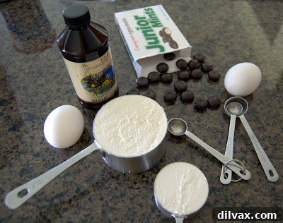 A delightful batch of freshly baked Junior Mint cookies, perfectly golden with visible mint pieces.