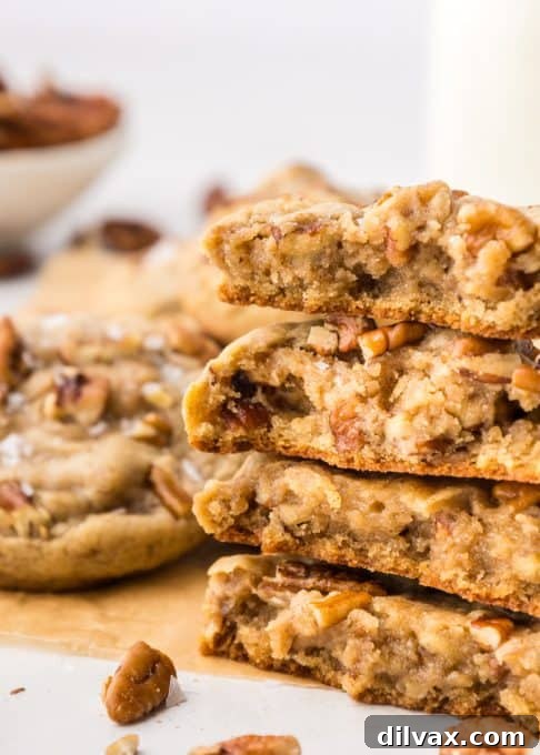Several Pecan Cookies artfully arranged on a serving plate, showcasing their inviting texture.