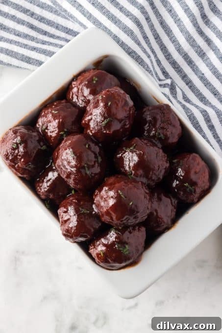 Easy 3-Ingredient Grape Jelly Meatballs 6 Crockpot Meatballs with chili sauce and grape jelly.