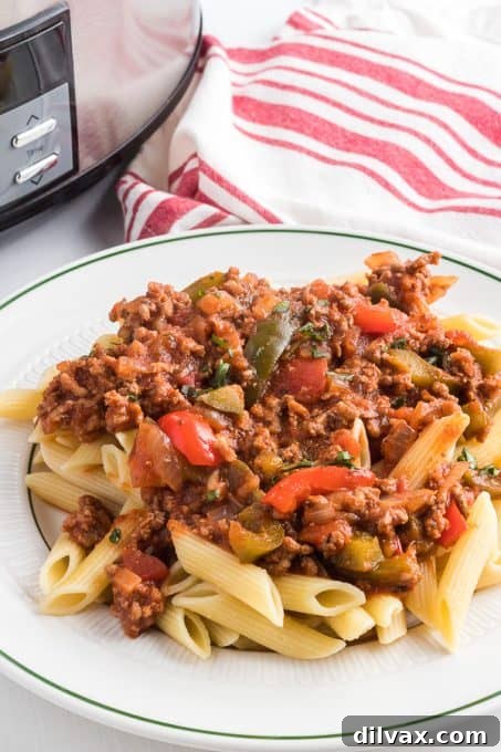 Dynamite sauce generously spooned over a bed of fresh pasta.