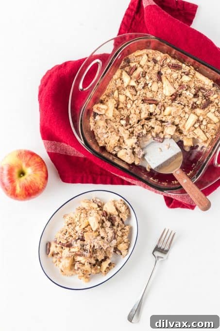 Baked Oatmeal with apple slices and a sprinkle of cinnamon.