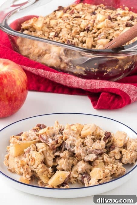 A Fall breakfast scene with baked oatmeal and decorative apples.