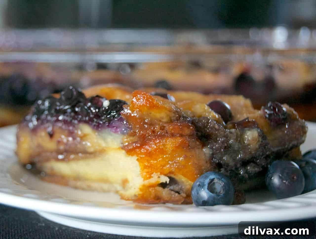 Delicious Baked Blueberry Waffles with caramel sauce and fresh blueberries
