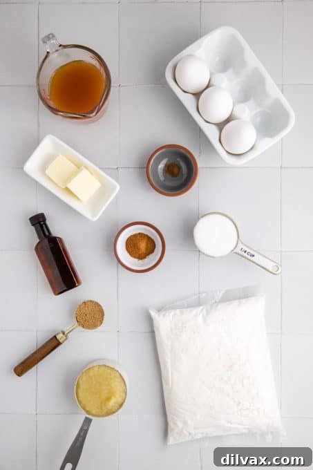 Ingredients laid out for Apple Cider Donut Cake, including cake mix, apples, cinnamon, and brown sugar.