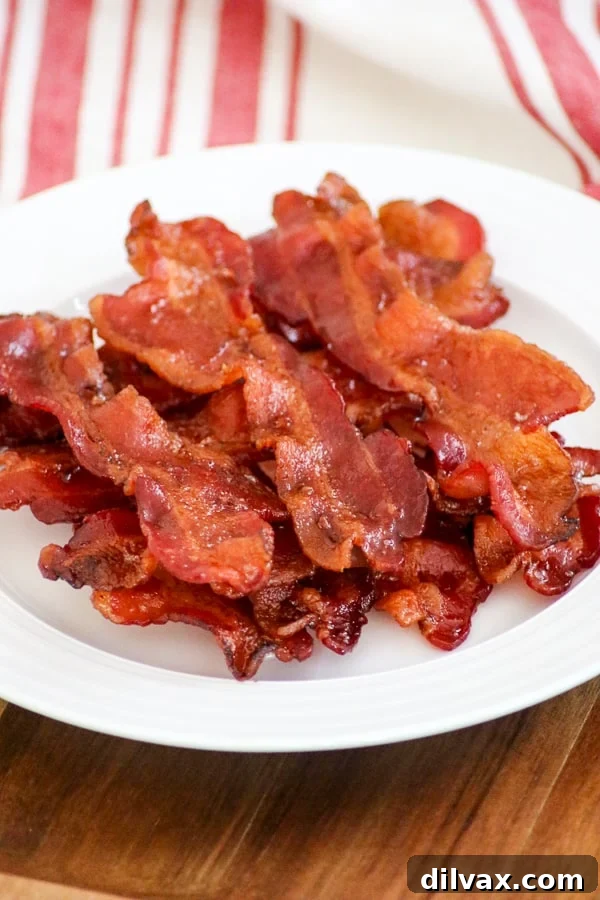 Bake bacon in the oven and it comes out perfectly! Bake bacon in the oven and it comes out perfectly!