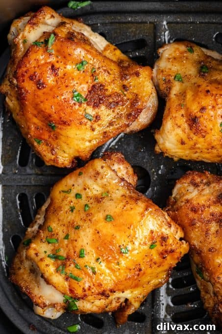 Crispy Air Fryer Chicken Thighs 13 Chicken Thighs cooked in the air fryer, ready to serve.