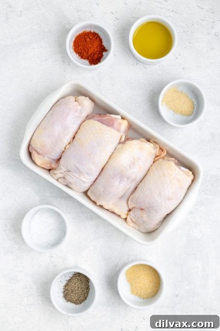 Crispy Air Fryer Chicken Thighs 4 Ingredients for Air Fryer Chicken Thighs laid out.
