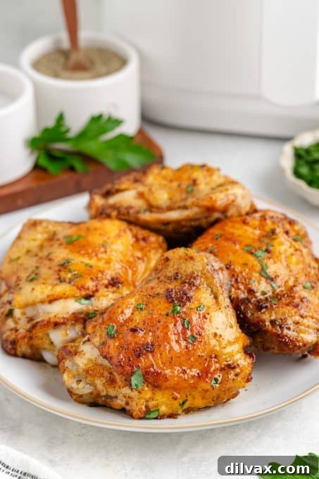 Crispy Air Fryer Chicken Thighs 8 Crispy Air Fryer chicken thighs ready to be served.