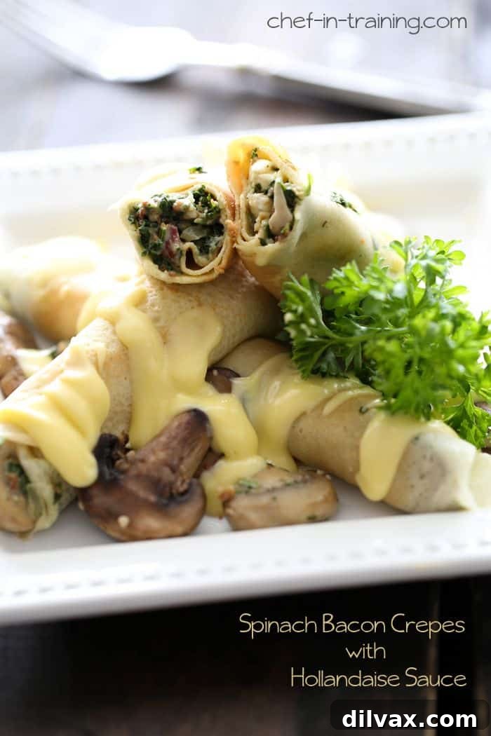 Spinach Bacon Crepes with a generous serving of Hollandaise Sauce