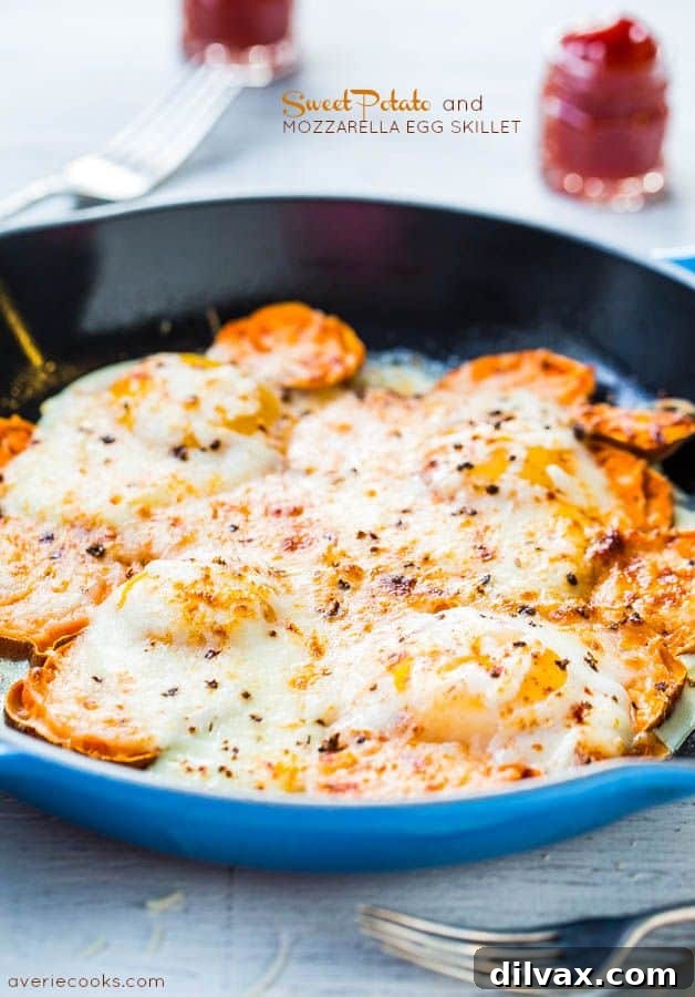 Sweet Potato and Mozzarella Egg Skillet with melted cheese