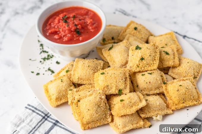 Crispy breaded ravioli for an appetizer with marinara.