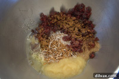 All cookie ingredients combined in a mixing bowl before mixing.