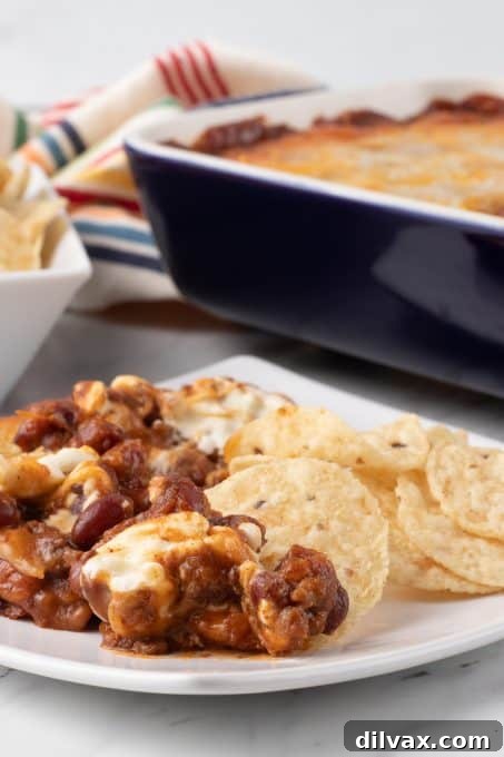 Easy Three Ingredient Chili Cheese Delight 3 Creamy 3-Ingredient Chili Cheese Dip ready to be served.