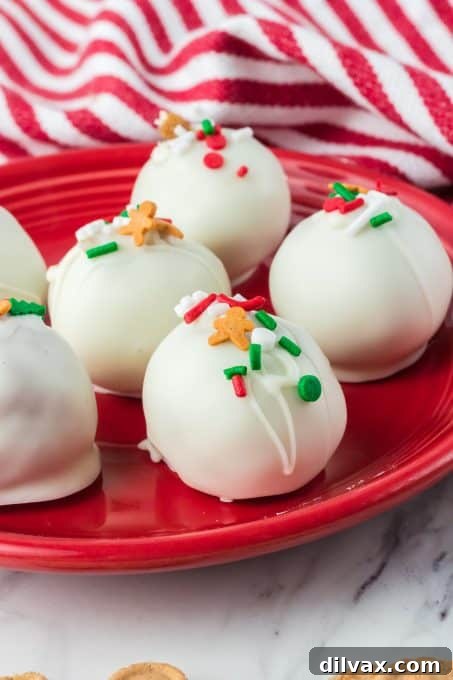 Spiced Holiday Truffle Treasures 10 A festive arrangement of white chocolate-coated gingerbread truffles with holiday sprinkles.