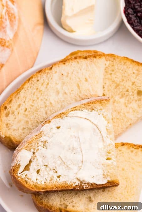 Various slices of Dutch oven baked bread, highlighting its versatility and serving potential.