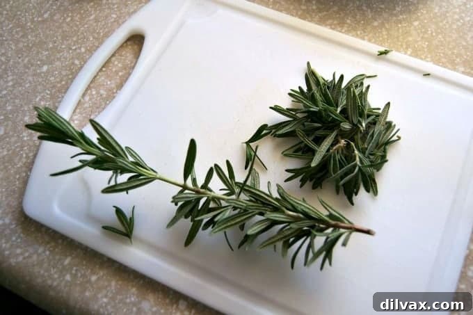 Effortlessly Destemming Fresh Herbs 2 Learn the easiest way to remove fresh rosemary and thyme leaves from their stems, saving you valuable time in the kitchen.