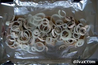 Pork Chops Layered with Onions and Mushrooms