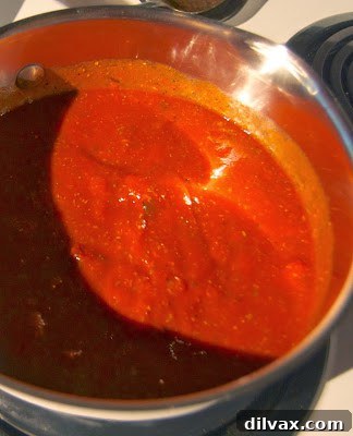 A perfectly cooked cheesy spiced pork burger with fresh toppings.