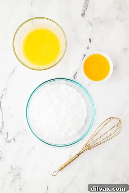 Ingredients for a glossy and vibrant Orange Glaze.