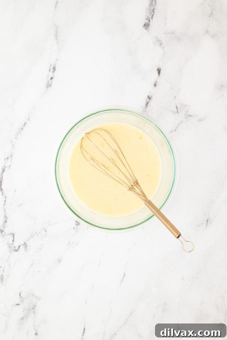 Rich and smooth Orange Glaze for bread pudding.