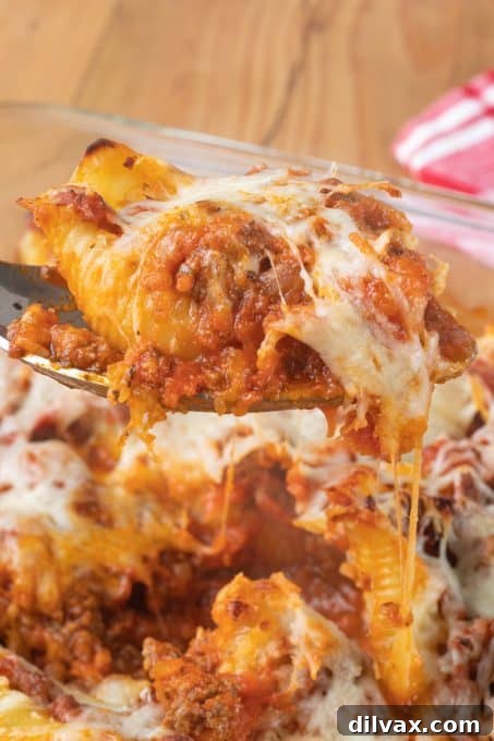 Hearty Baked Stuffed Shells 7 A serving of baked stuffed shells on a plate