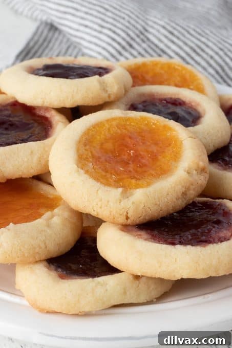 Sweet Indentations 8 Cookies filled with fruit preserves.