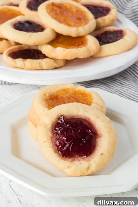 Jewel Box Cookies 9 A single buttery thumbprint cookie with a glistening preserve center.