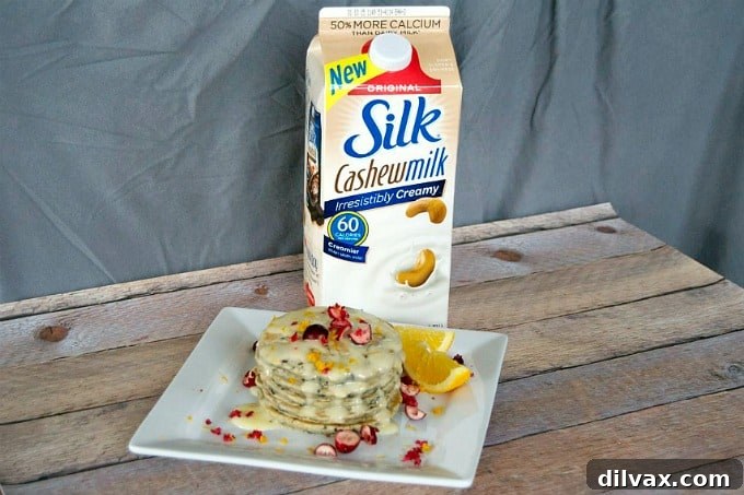 Close-up of golden Cranberry Pancakes, showcasing their fluffy texture and delicious filling.