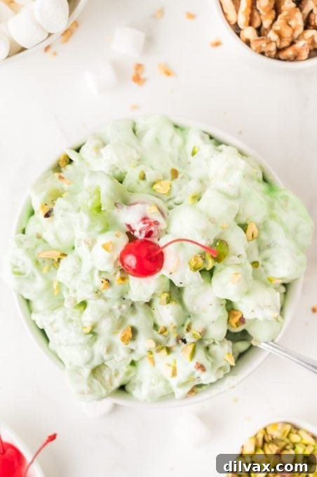 Pistachio pudding, pineapple, cherries, Cool Whip and pistachios.