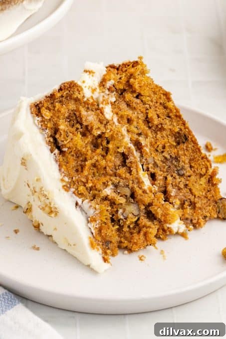 Full Pineapple Carrot Cake, decorated with walnuts.
