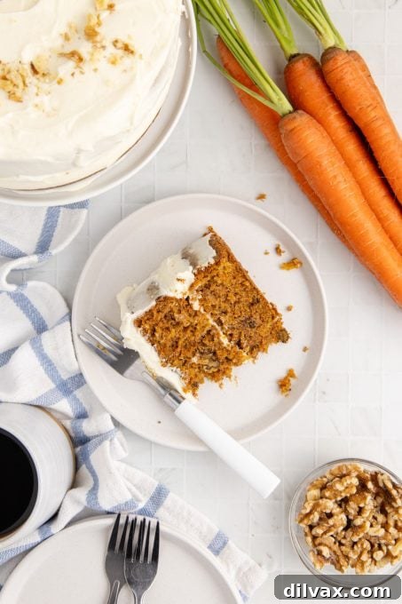 A perfectly sliced piece of carrot pineapple cake.