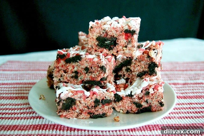 Peppermint Oreo Krispie Bars 2 Rice Krispies Treats with Winter Oreos, peppermint, and Andes Peppermint Crunch! A tasty and colorful holiday treat!