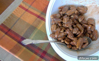 Sugared Pecans spread on a baking sheet