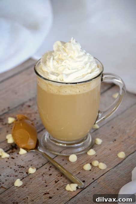 Wintermint White Chocolate Mocha 9 Cookie Butter White Chocolate Mocha - Folgers Instant Coffee Crystals, cookie butter, melted white chocolate, milk and cream.