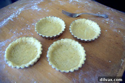 Zesty Lime Curd Tartlets 3 Partially baked tart shells in their tins